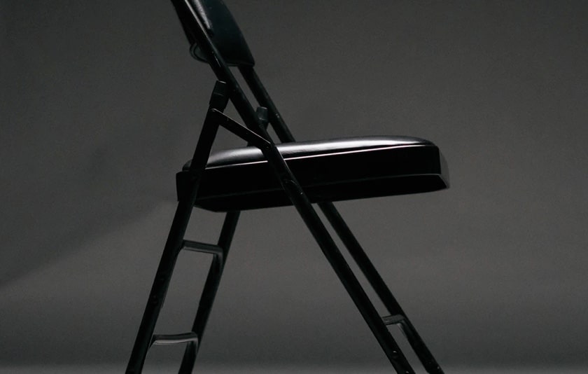 a black foldable chair